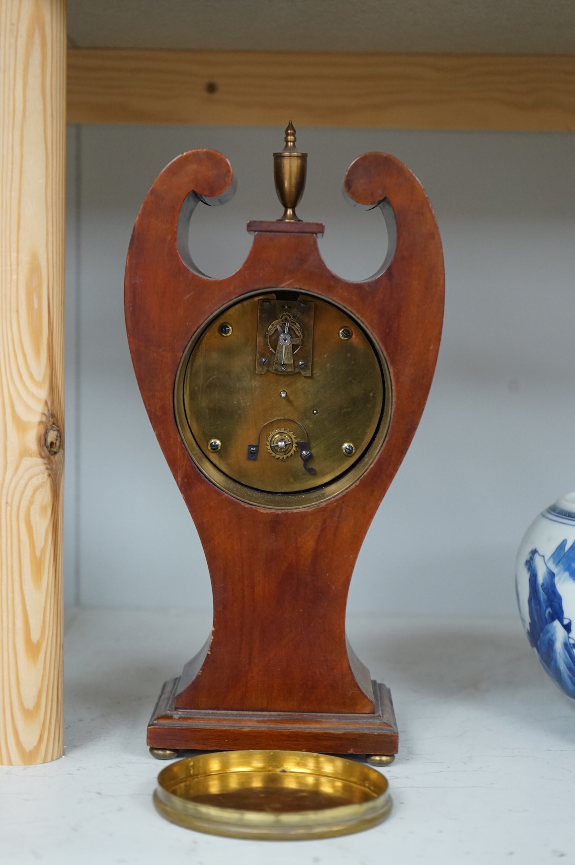 An Edwardian inlaid mahogany mantel timepiece, 28cm high
